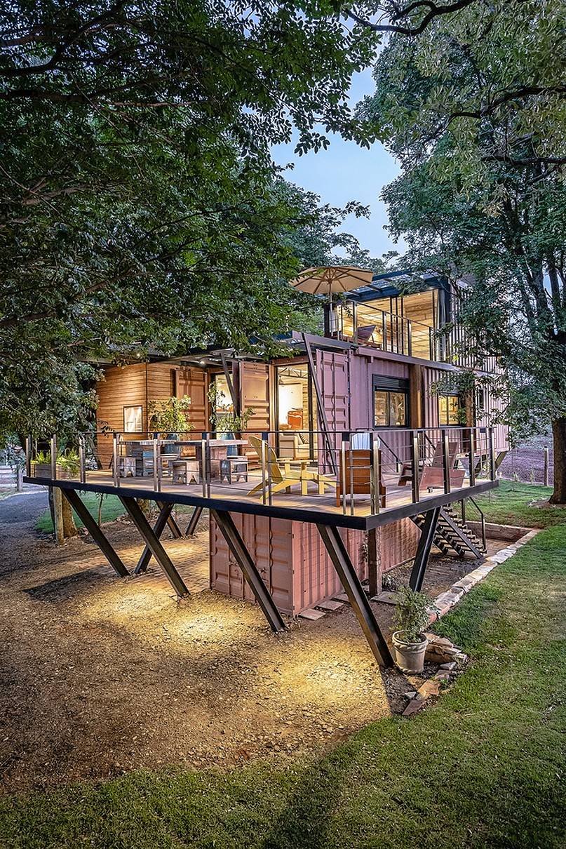 Elevated shipping container house with balcony