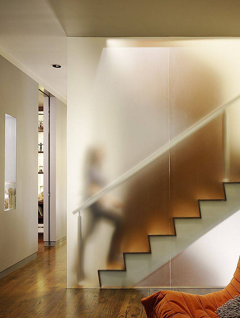 Indoor polycarbonate wall acts as guardrail for the stairway