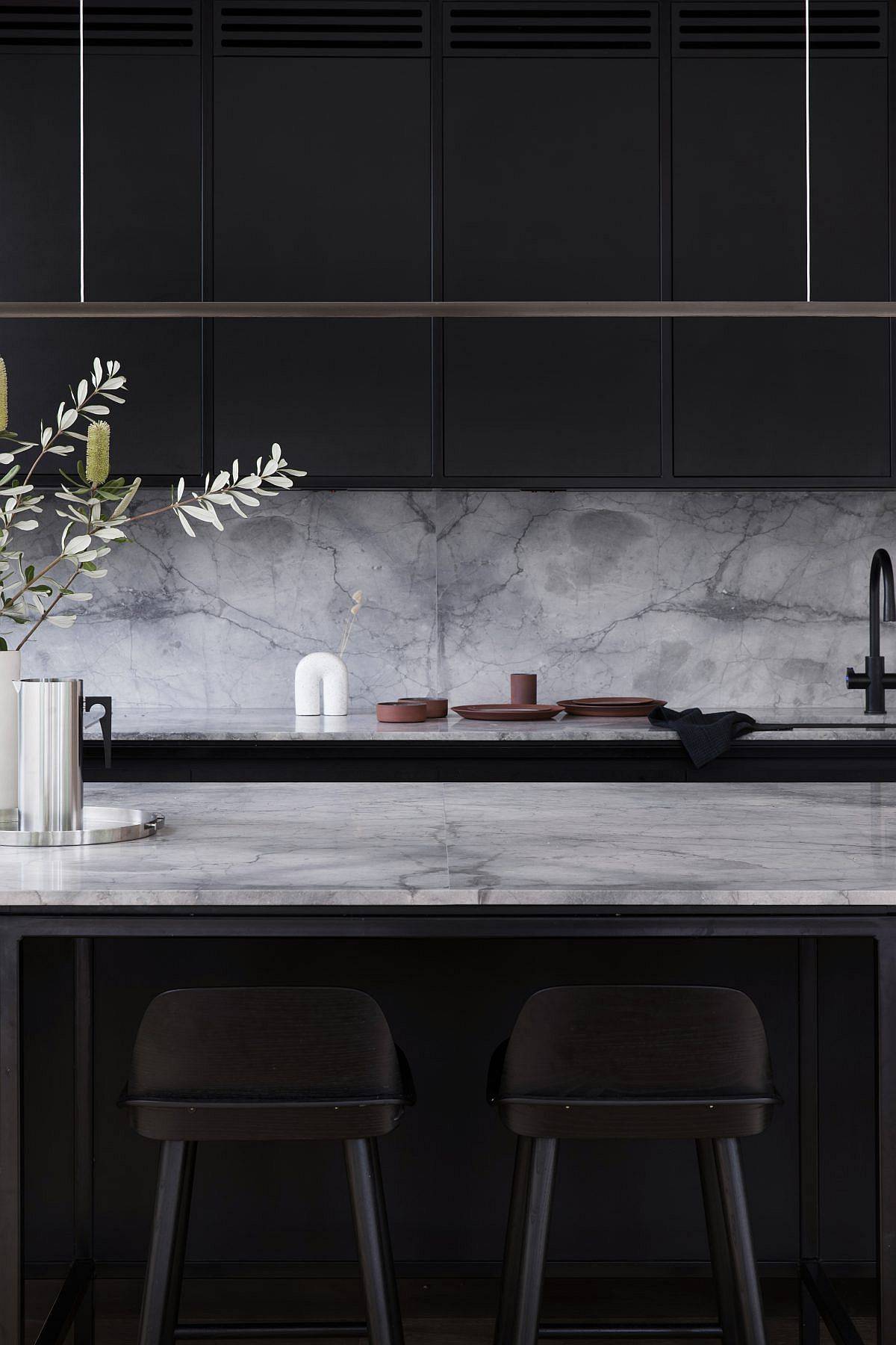 Marble adds class and elegance to the contemporary kitchen in black and white