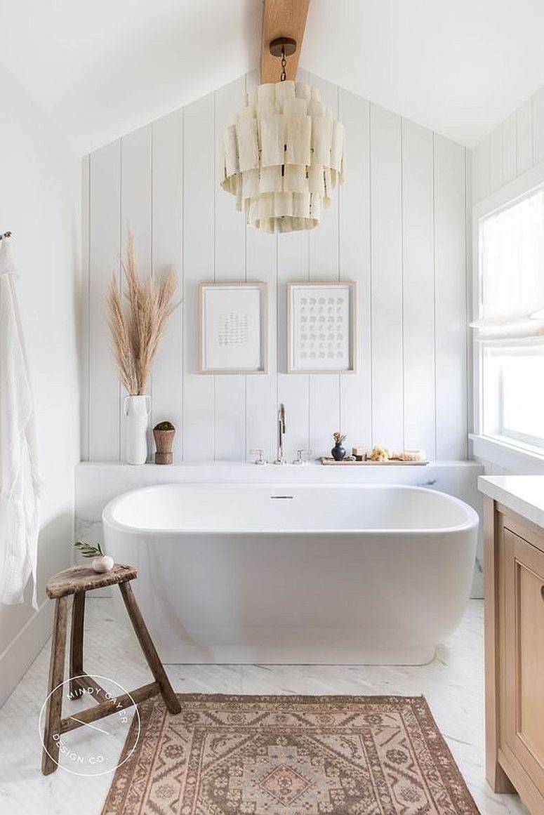 Modern rustic bathroom in white with a ouch of woodsy elegance and a whole lot of luxury