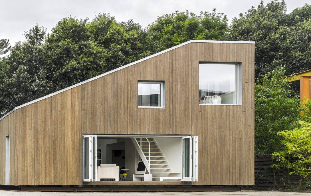 Sloped roof container house with two large windows