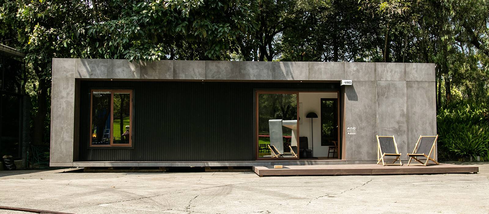 Two lounge chairs outside container home