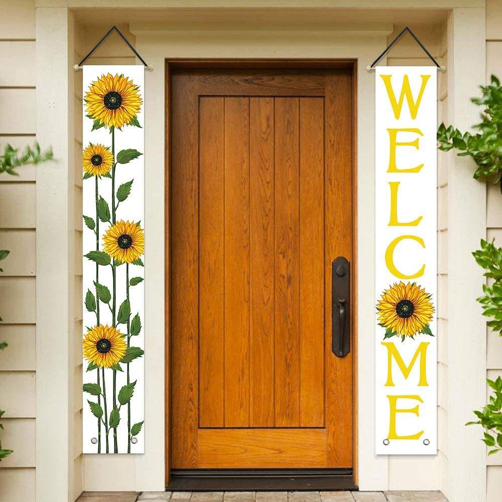 Welcome and sunflower banners on either side of brown door