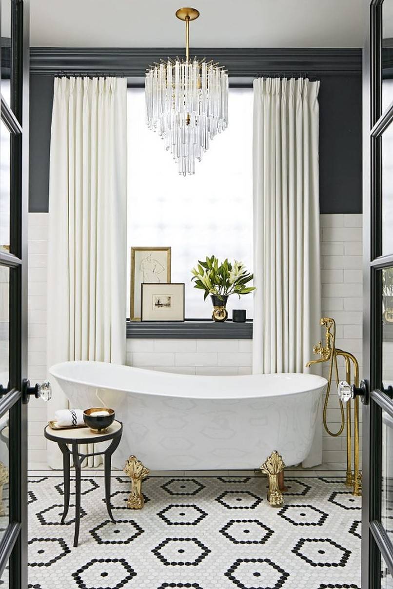 Bathtub with gold legs and faucet