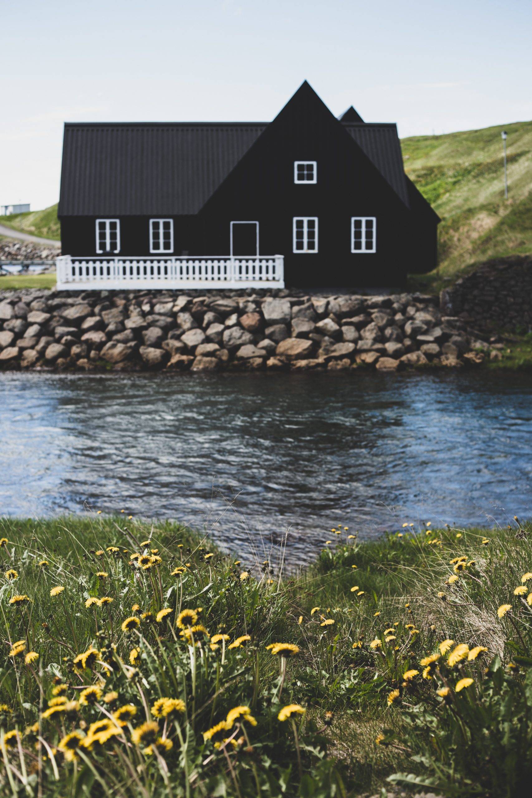 Black house by the river