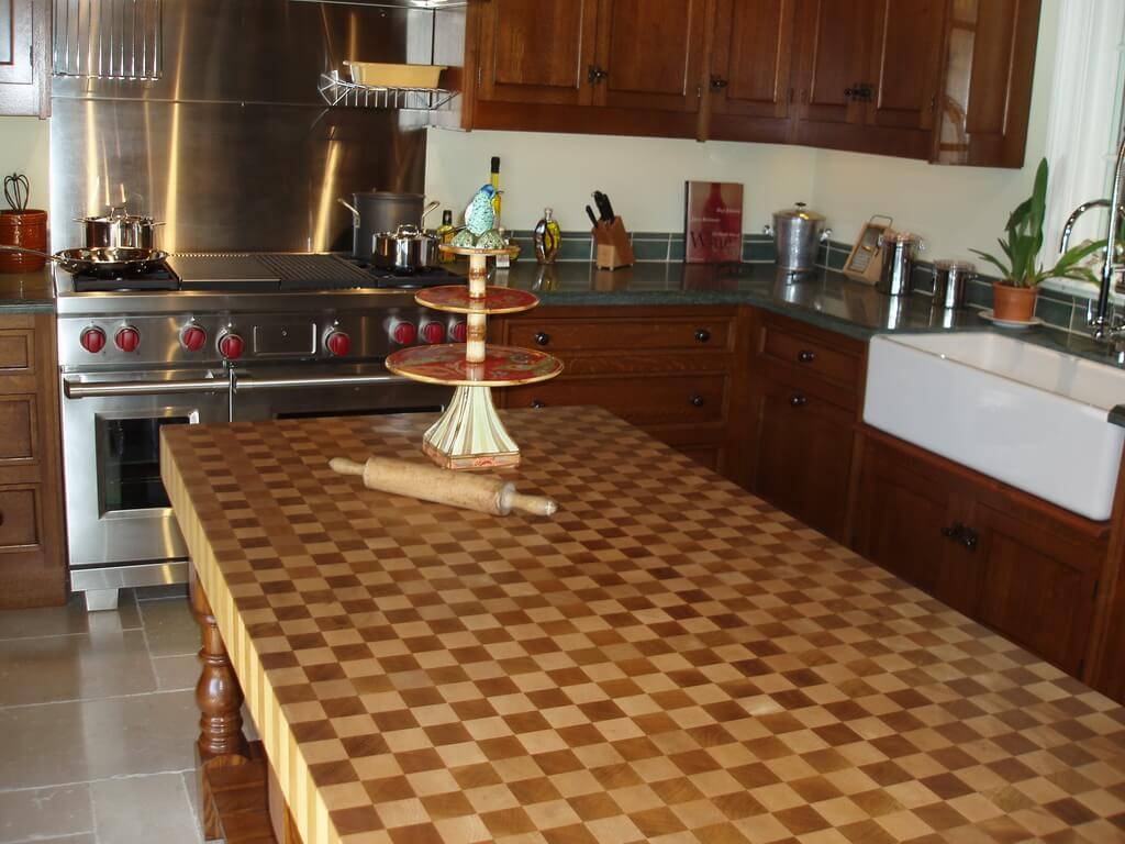 Cake stand on countertop with checkerboard pattern