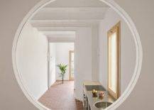 Circular-window-connects-the-kitchn-and-the-living-area-with-the-dining-space-or-secondary-room-42282-217x155