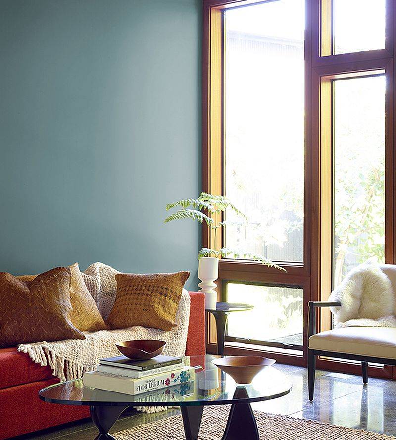 Combine a teal backdrop with other fabulous bright colors in the living room