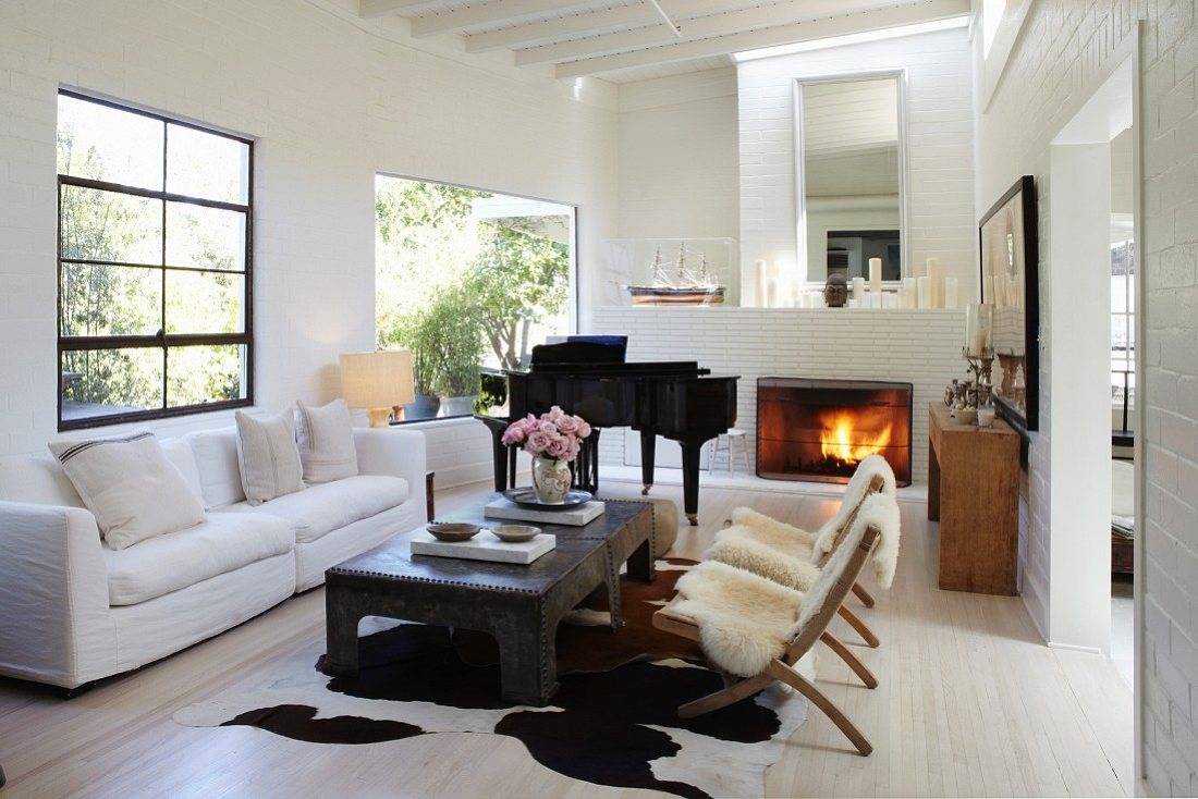 Eclectic Mix of Furniture with Cowhide Rug