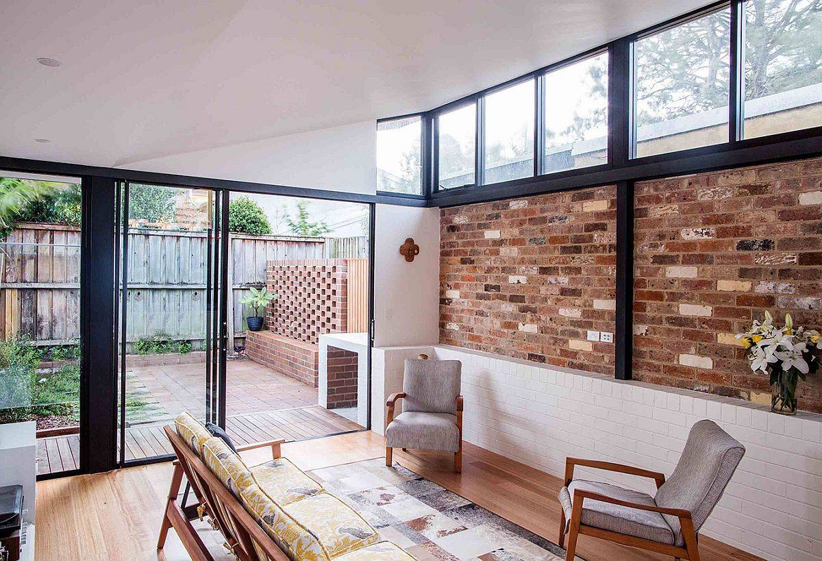 Elegant Modern renovation of cottage in Annandale with brick walls and clerestory windows