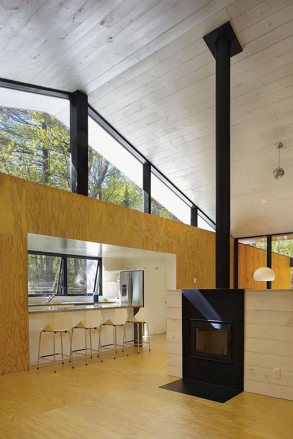 Gabled roof allows for aesthetic use of clerestory windows in this home