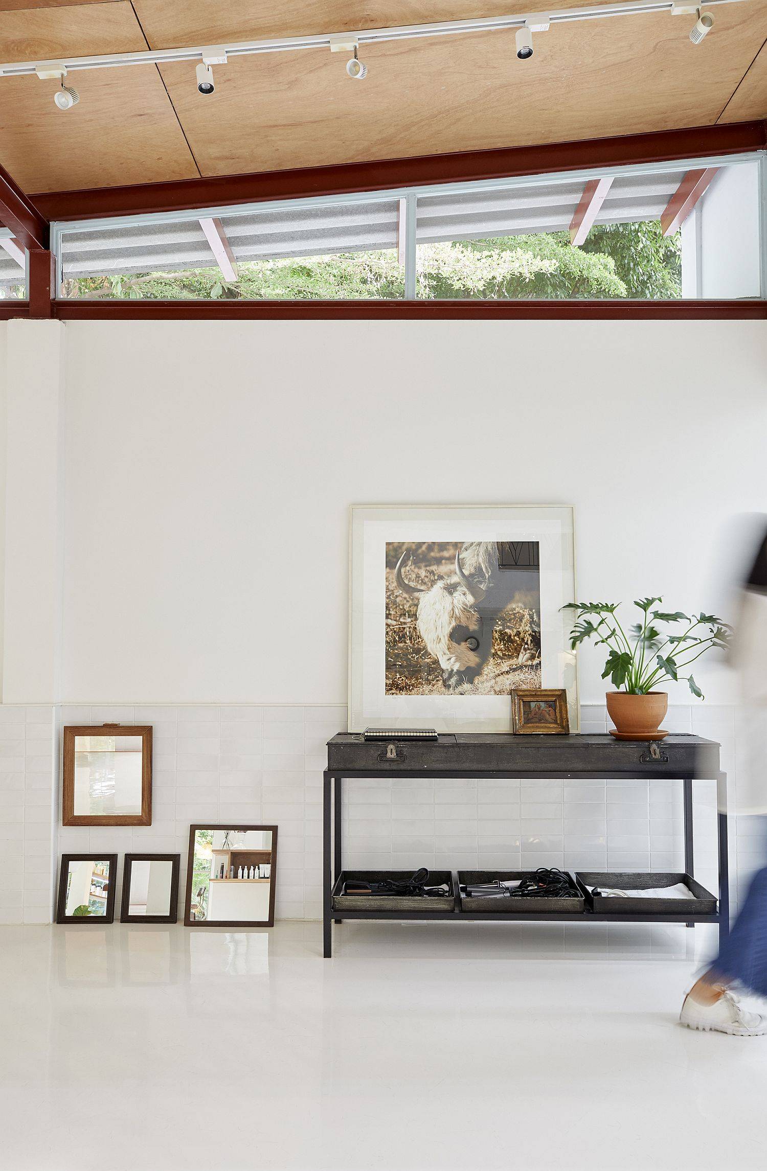 Gorgeous all-white contemporary interior with smart clerestory lights