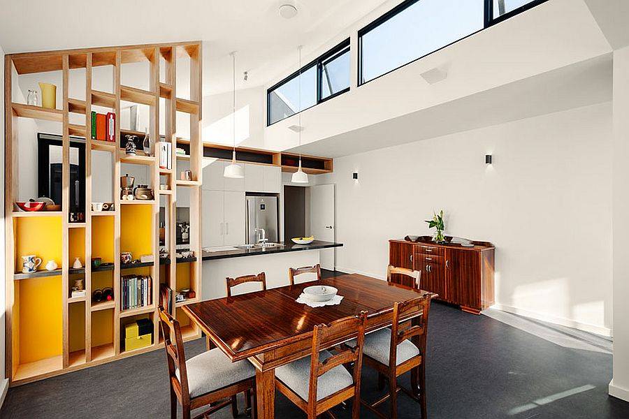 Kitchen and dining area of renovated Victorian home with clerestory windows