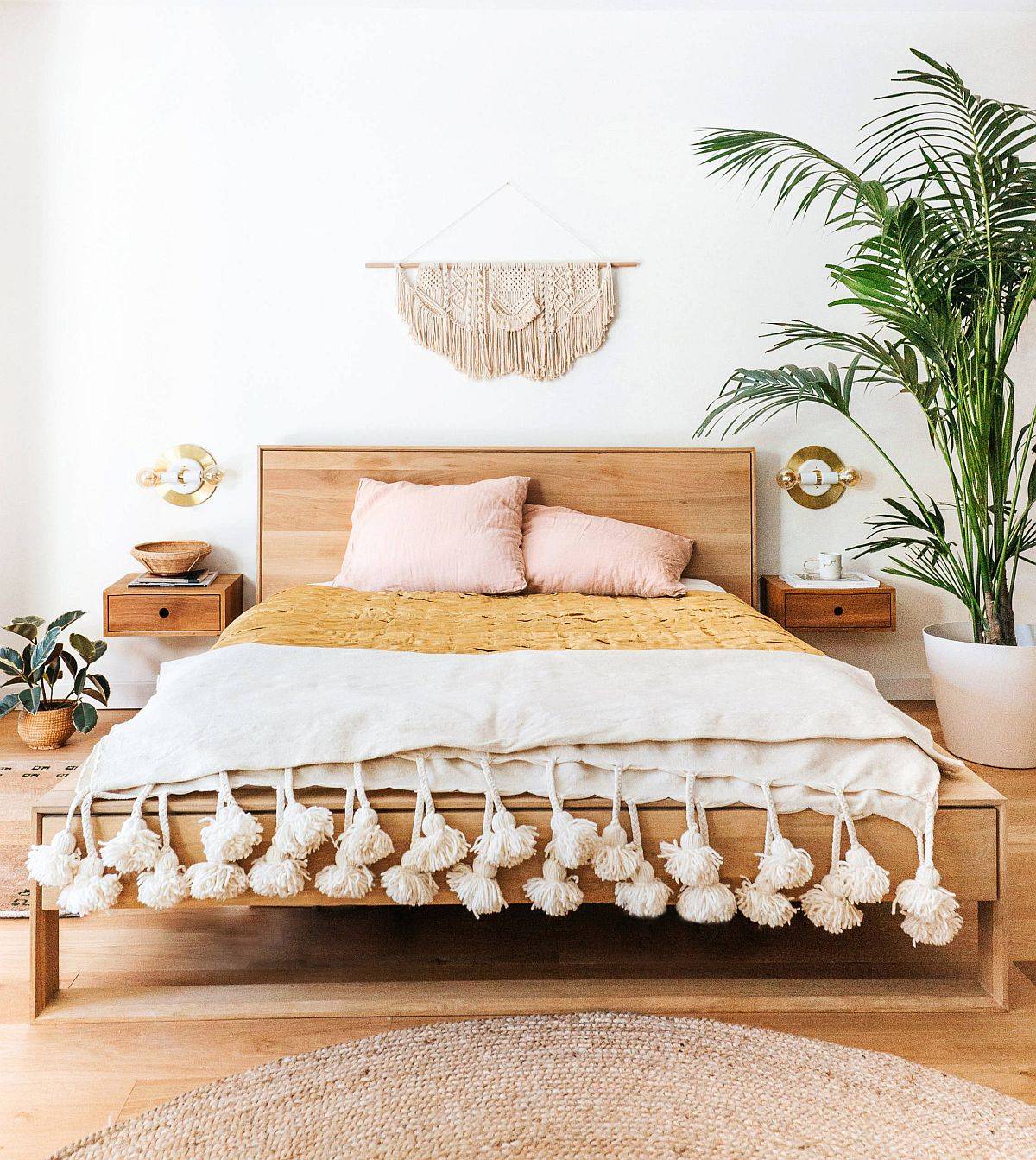 Light wooden floor and natural textures create a lovely, cozy and casual modern bedroom