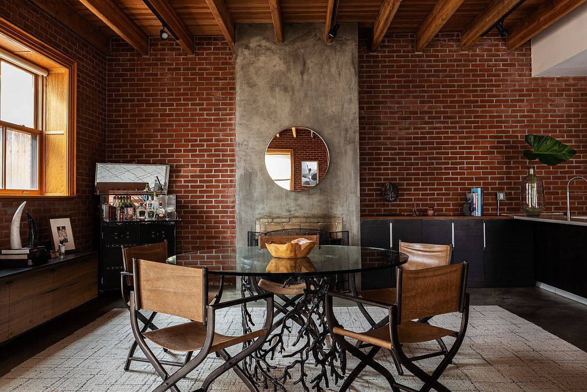 Modern dining room with brick wall in the backdrop