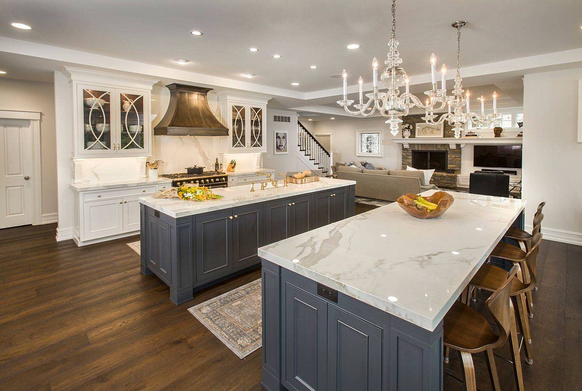 Modern-traditional kitchen with marble counertops, twin islands and jointery in gray