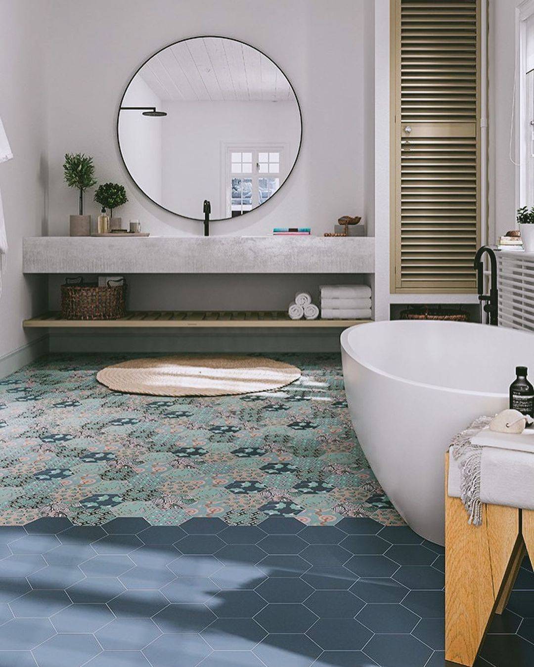 Plain blue and printed hex tiles on bathroom floor