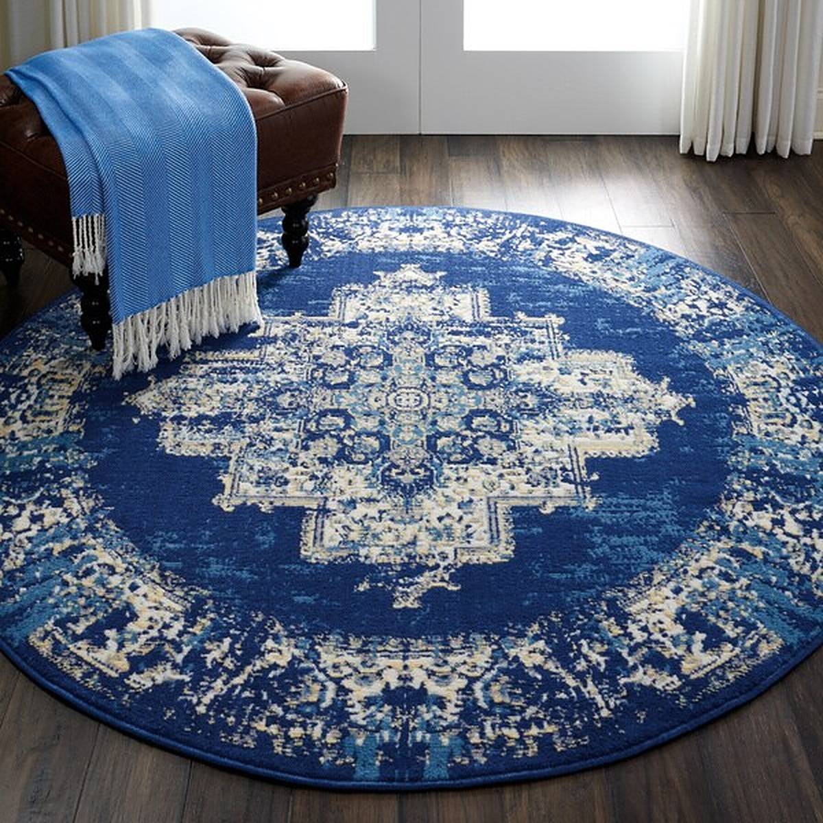 Round blue bohemian rug in doorway