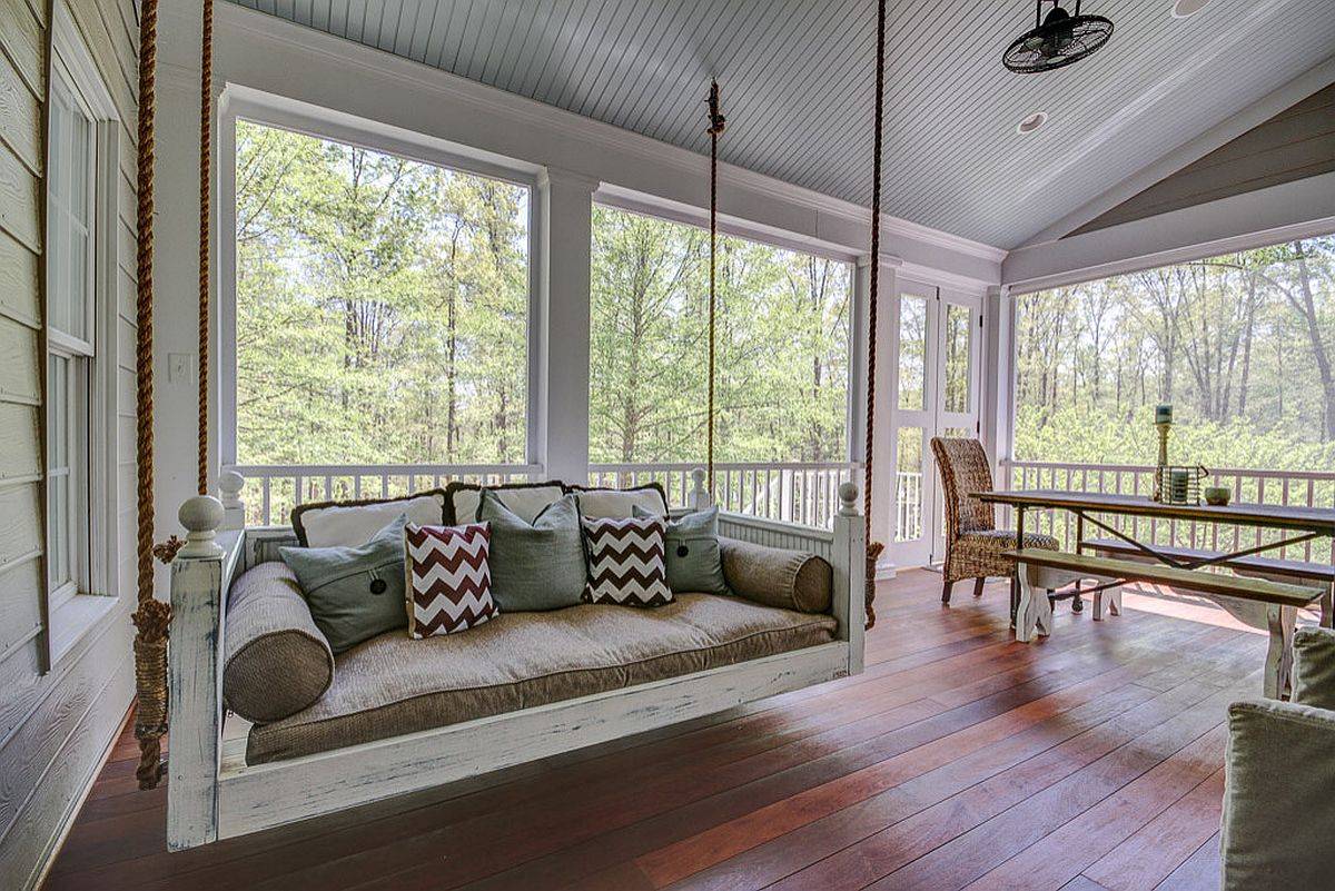 Shabby-chic-porch-with-fabulous-views-along-with-daybed-and-dining-table-is-just-perfect-for-a-staycation-27909