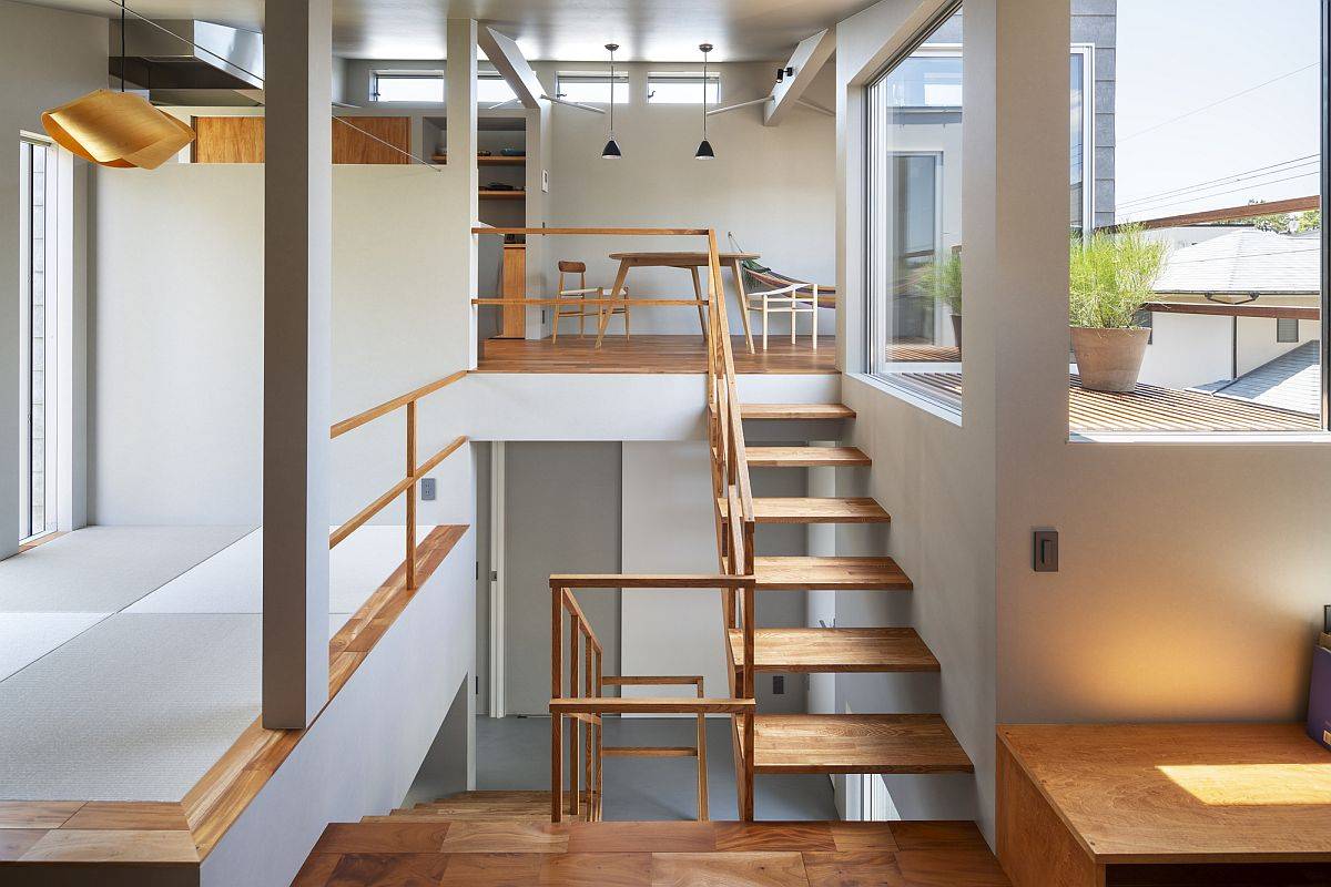 Split-level dining area, kitchen and living room of the home along with the Japanese room