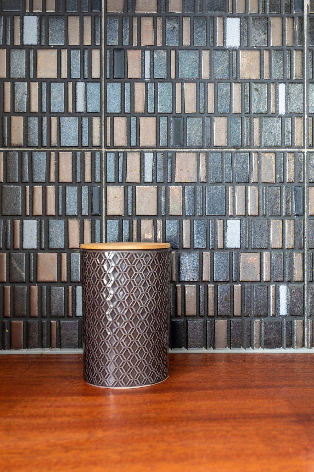 Taking a closer look at the custom mosaic backsplash in the small apartment kitchen