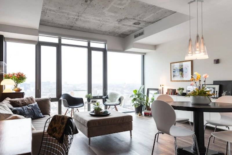 Condo Living Area with Floor to Ceiling Windows