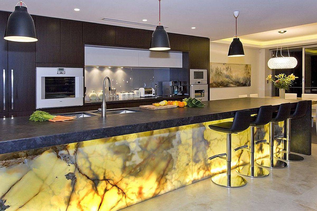 Brilliantly illuminated Onyx kitchen island is a showstopper almost every single time!