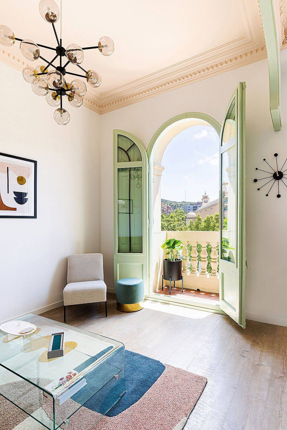 Ceiling in pastel pink along with classic French doors in pastel green give the room a fabulous visual appeal