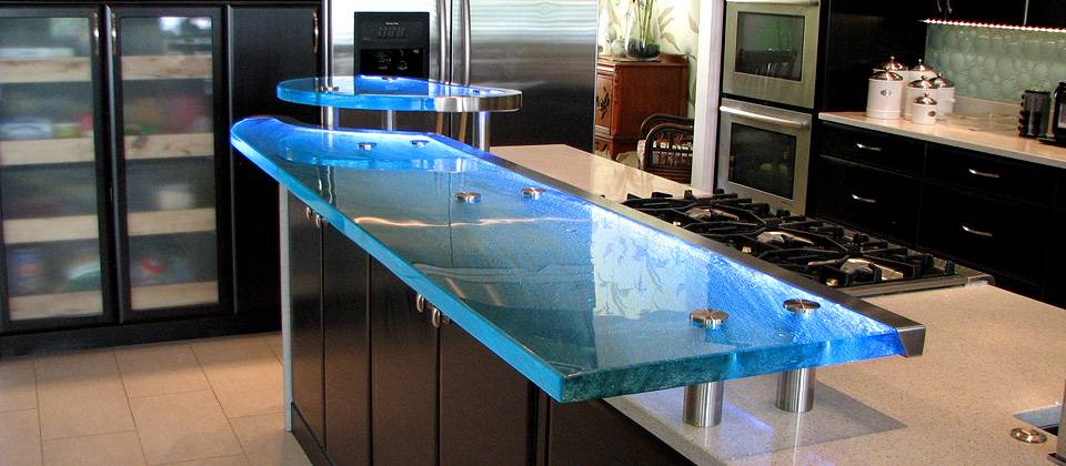 Dark Cabinetry with Glass Countertop.