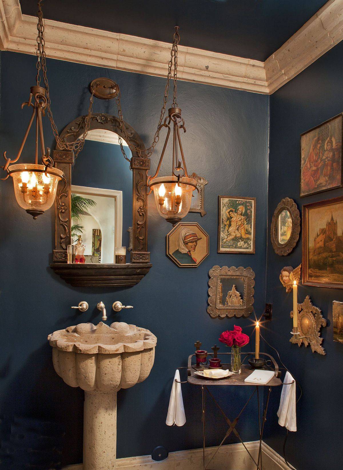 Eclectic charm coupled with Spanish Colonial overtones in the colorful powder room