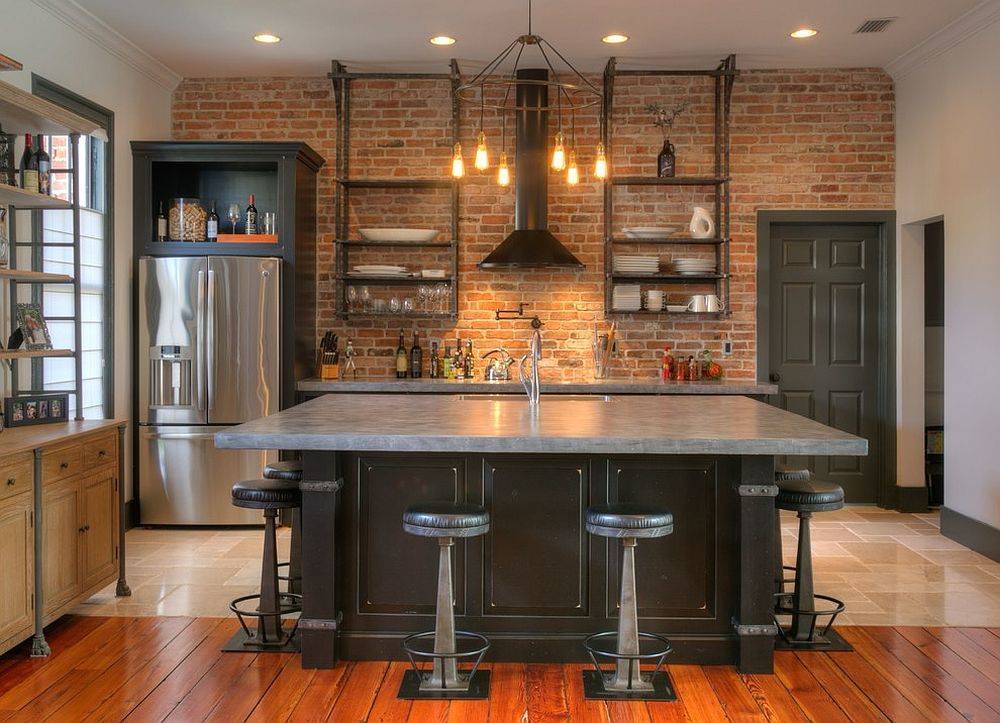 Fabulous kitchen remodel with red brick backsplash, industrial style, concrete countertops and gorgeous chandelier lighting