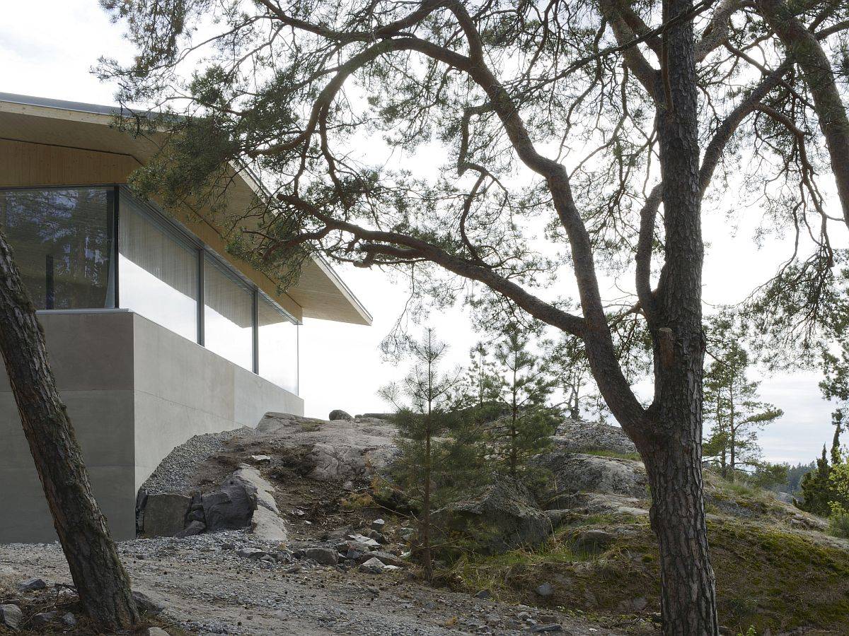 Fabulous private home on an island in Sweden with greenery and sandy landscape all around