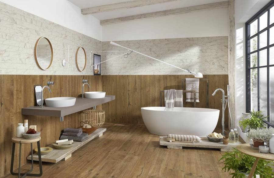 Full Wood Tile Bathroom With White Bathtub.