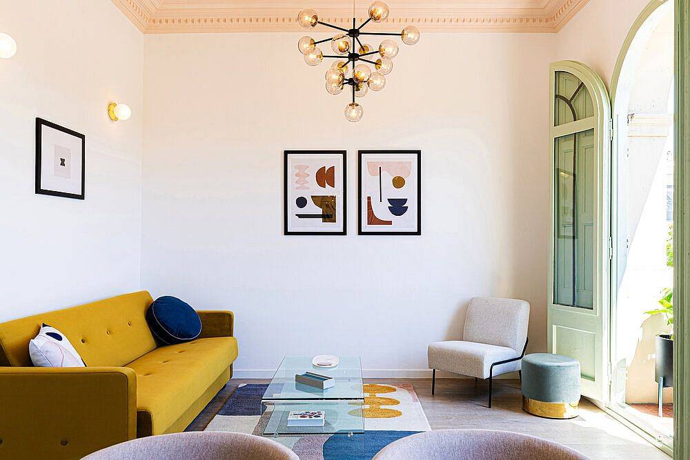 Modern-art-and-bright-yellow-couch-steal-the-show-in-this-small-living-room-78884