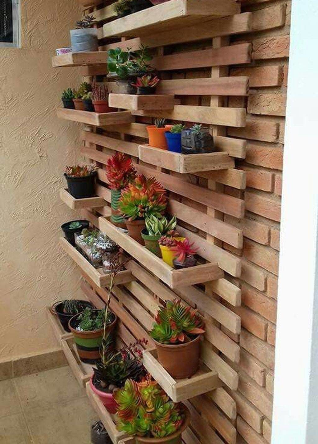 vertical hanging garden against wooden slat