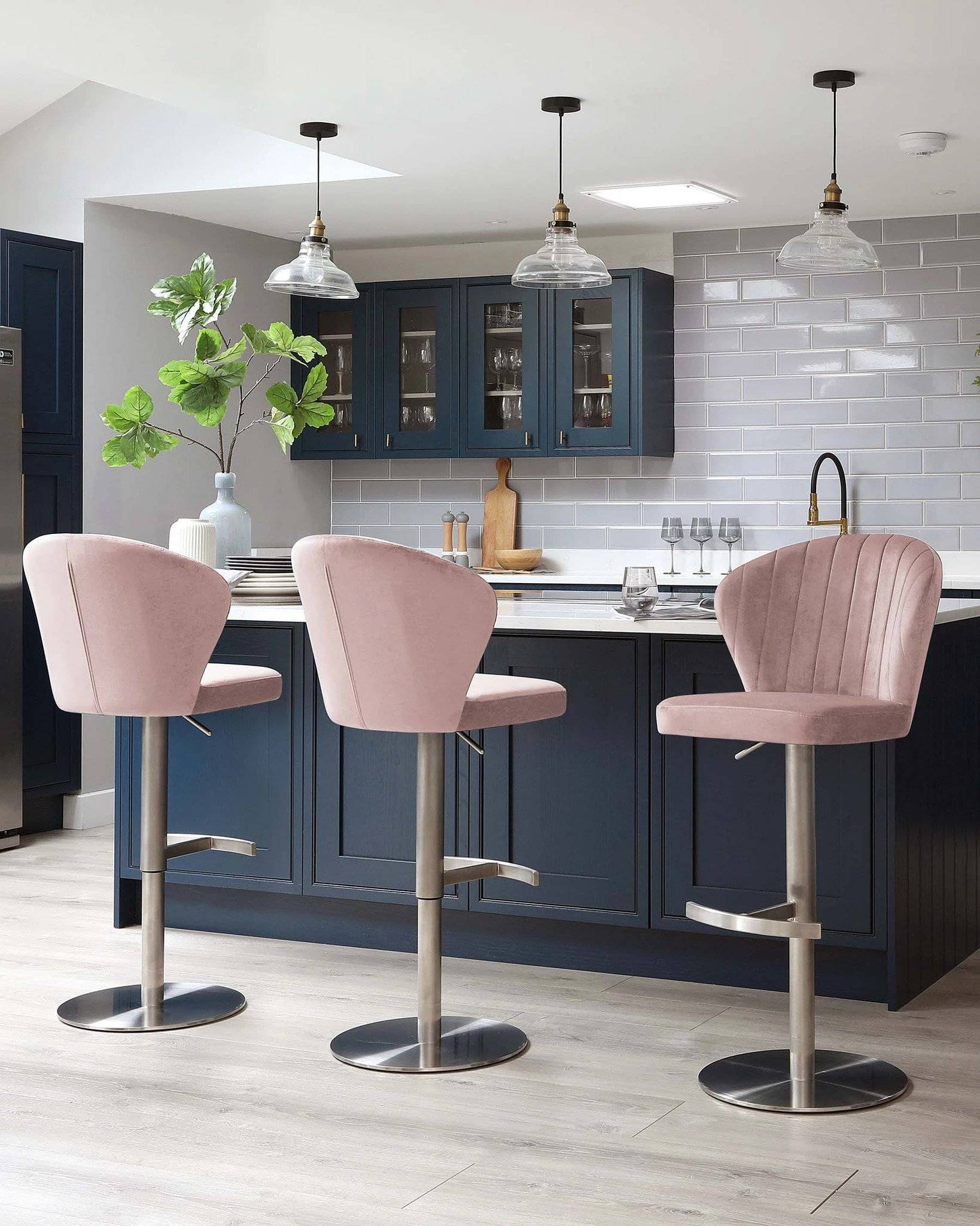 Pink Cushioned Stools and Pendant Lamps