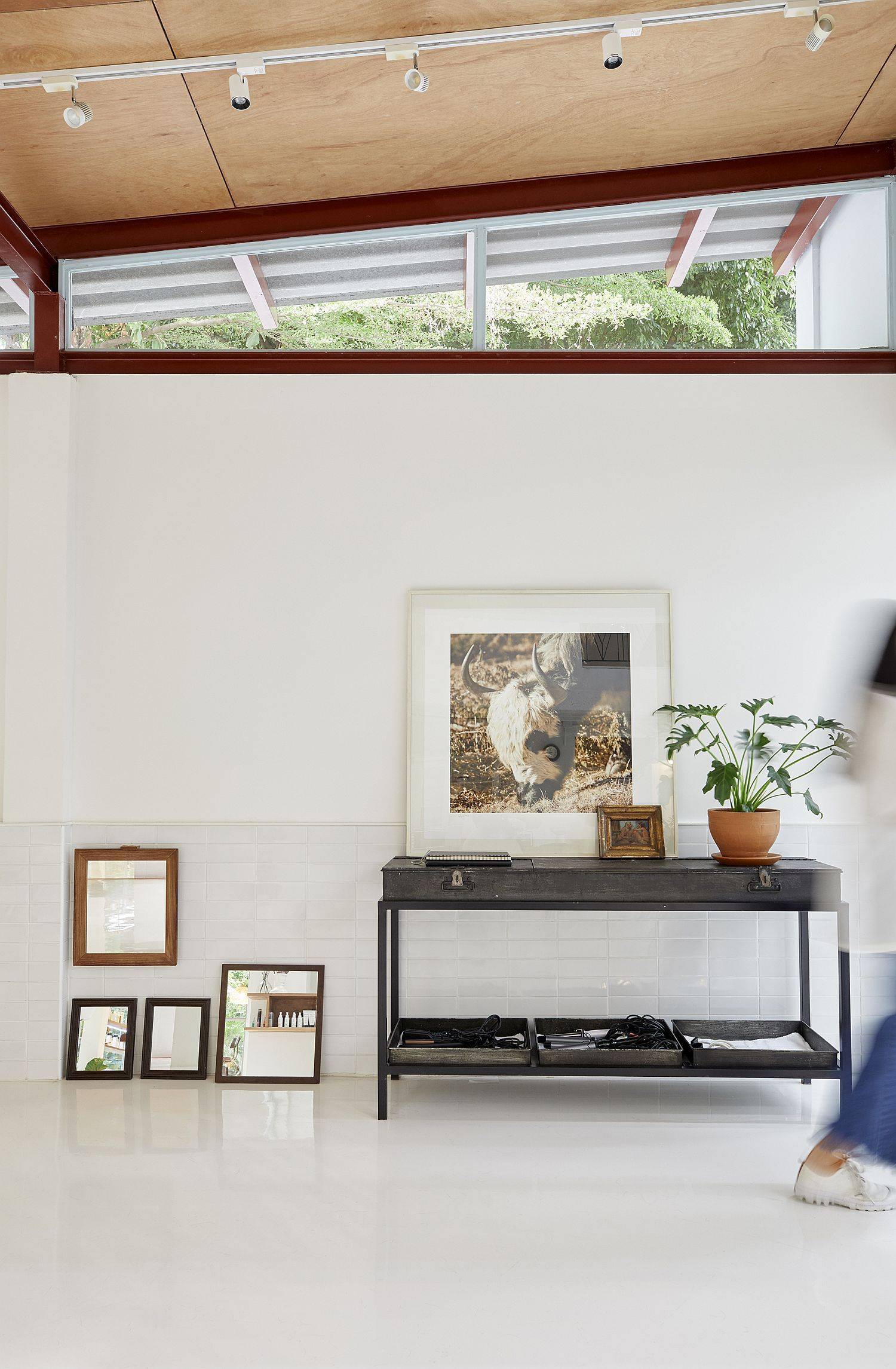 Polished contemporary home with clerestory windows that usher in just the right amount of light without heat