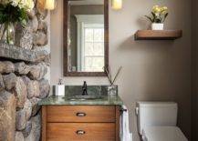 Rustic-powder-room-inspired-by-the-classic-cabin-style-in-New-York-with-a-stone-wall-10787-217x155