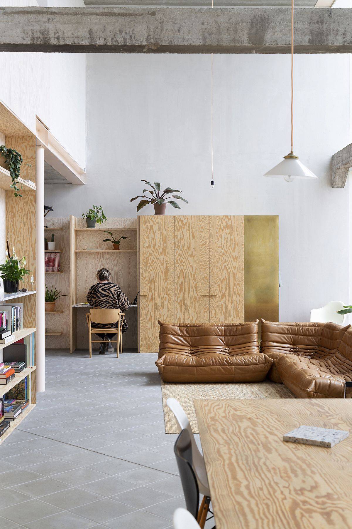 Wooden decor, Togo sofa and neutral interior of the modern home living room