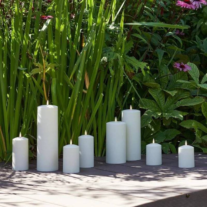 candles on patio against grass