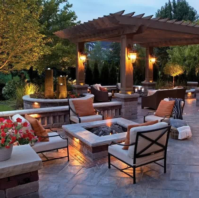 backyard patio set up with lanterns