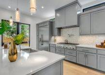 Dove grey granite countertops among shades of grey kitchen decor