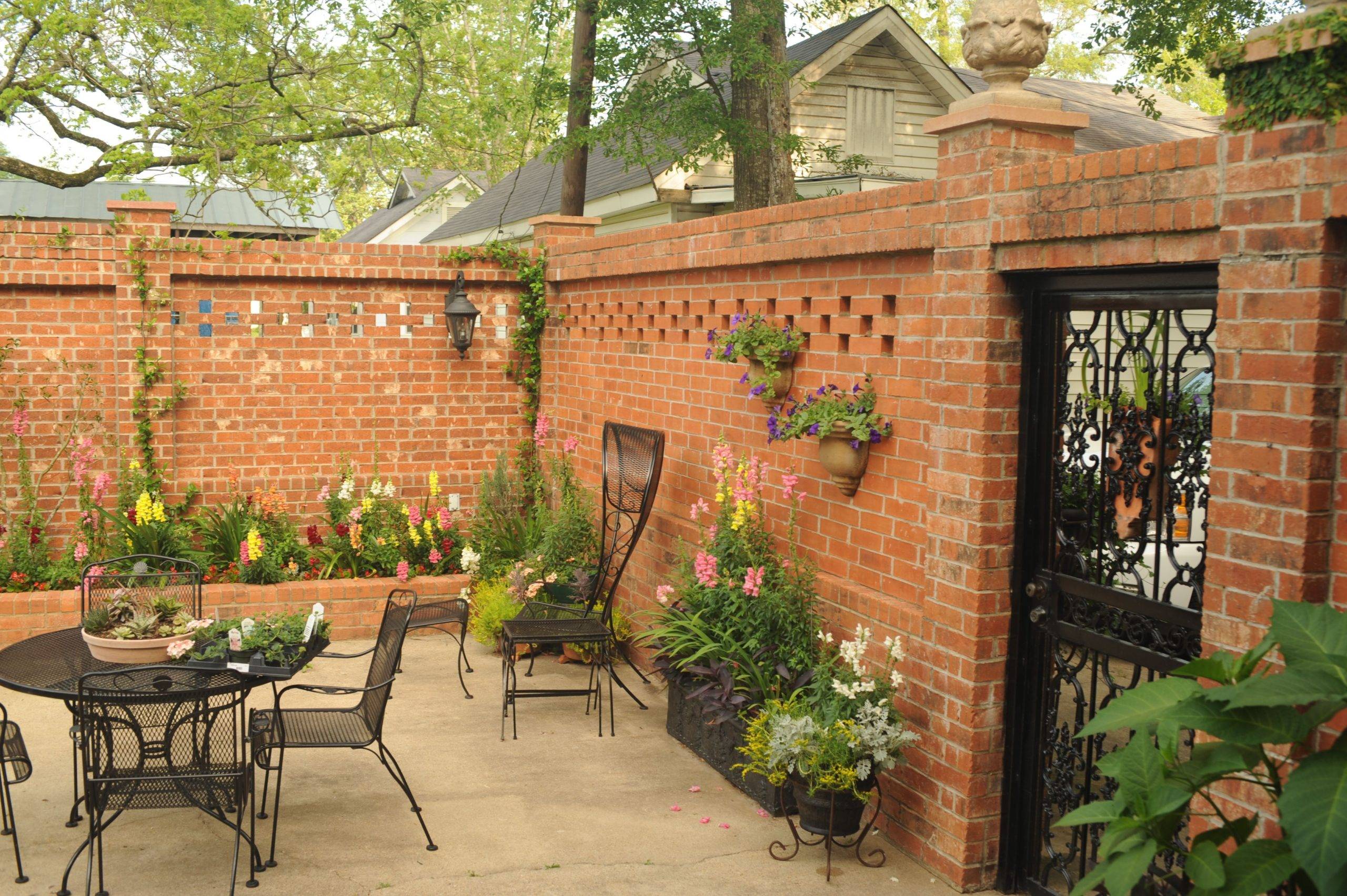 brick privacy fence backyard patio