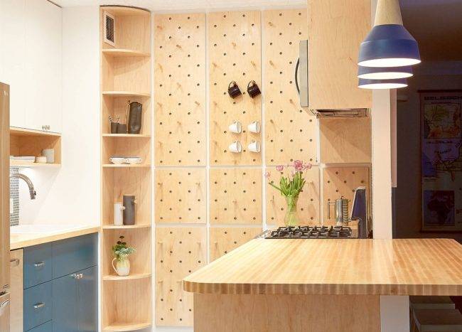 Bespoke-pegboard-wall-for-the-kitchen-saves-up-ample-storage-and-shelf-space-92375-217x155