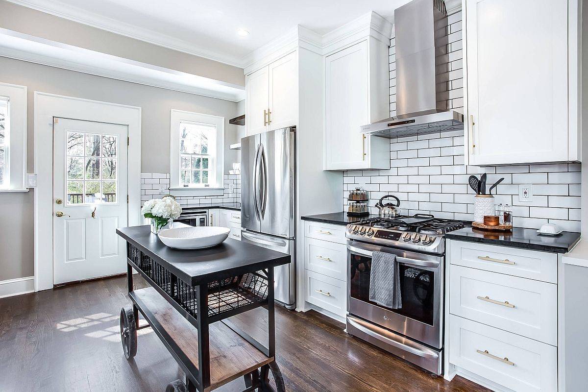 Custom island adds to the industrial style of the kitchen