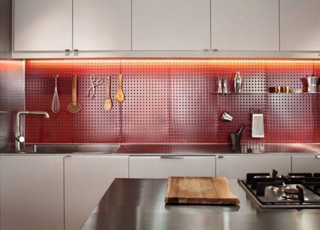 Custom-pegboard-backsplash-in-the-kitchen-also-adds-a-lovely-dash-of-bright-red-to-the-contemporary-space-62295-217x155