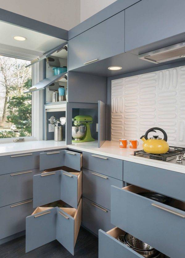 Gray Corner Cabinets And Custom Units Offer A Variety Of Delightful Storage Options In This Kitchen 84412 600x839 