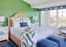 green wall bedroom bed blue bedding large windows ottomans blankets bedside lamp