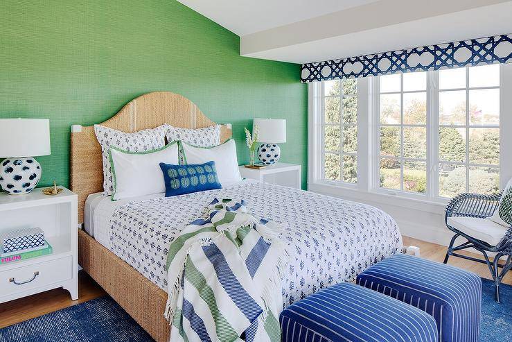 green wall bedroom bed blue bedding large windows ottomans blankets bedside lamp