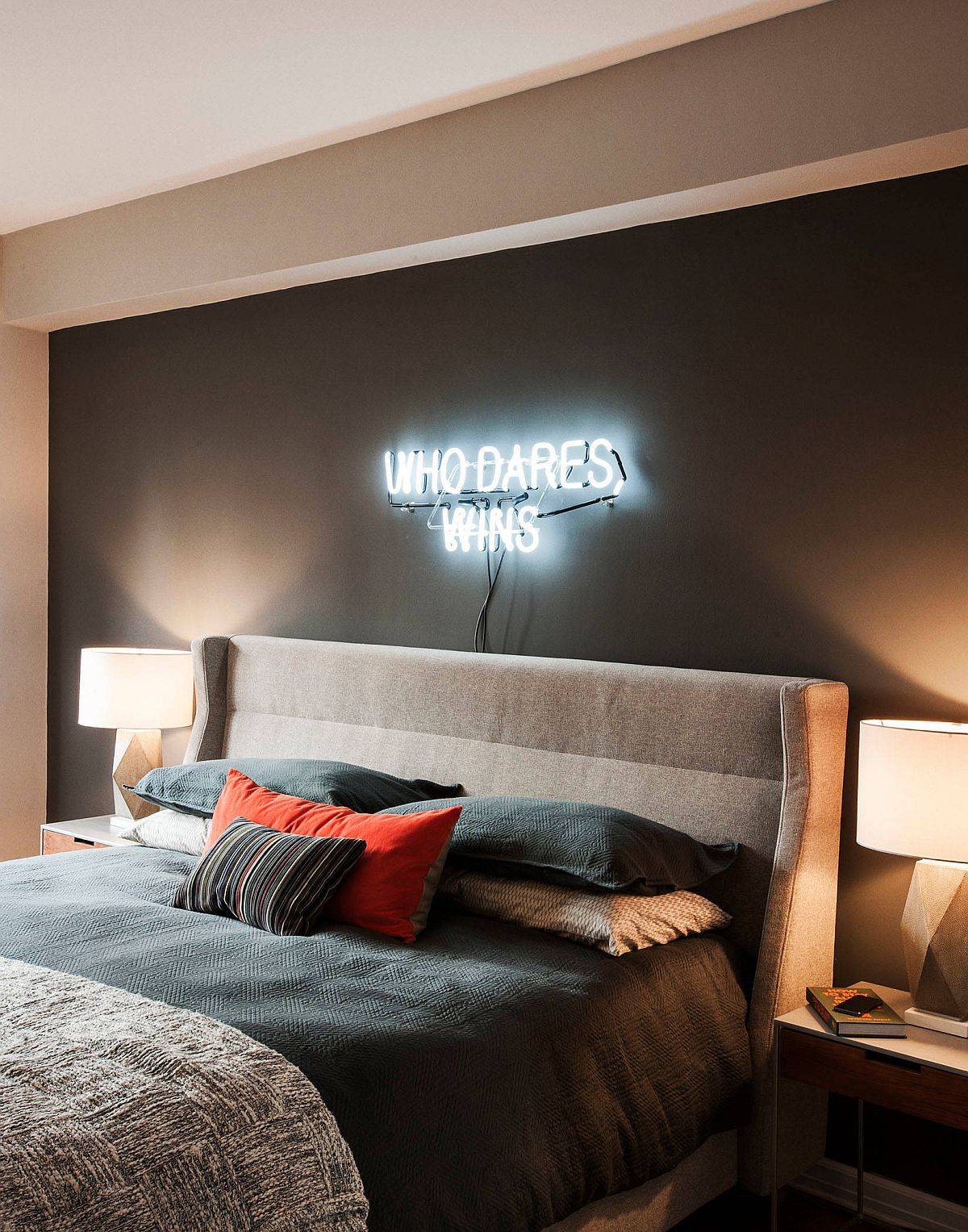 Illuminated-sign-on-the-wall-only-adds-to-the-aura-of-this-classy-bachelor-bedroom-59400